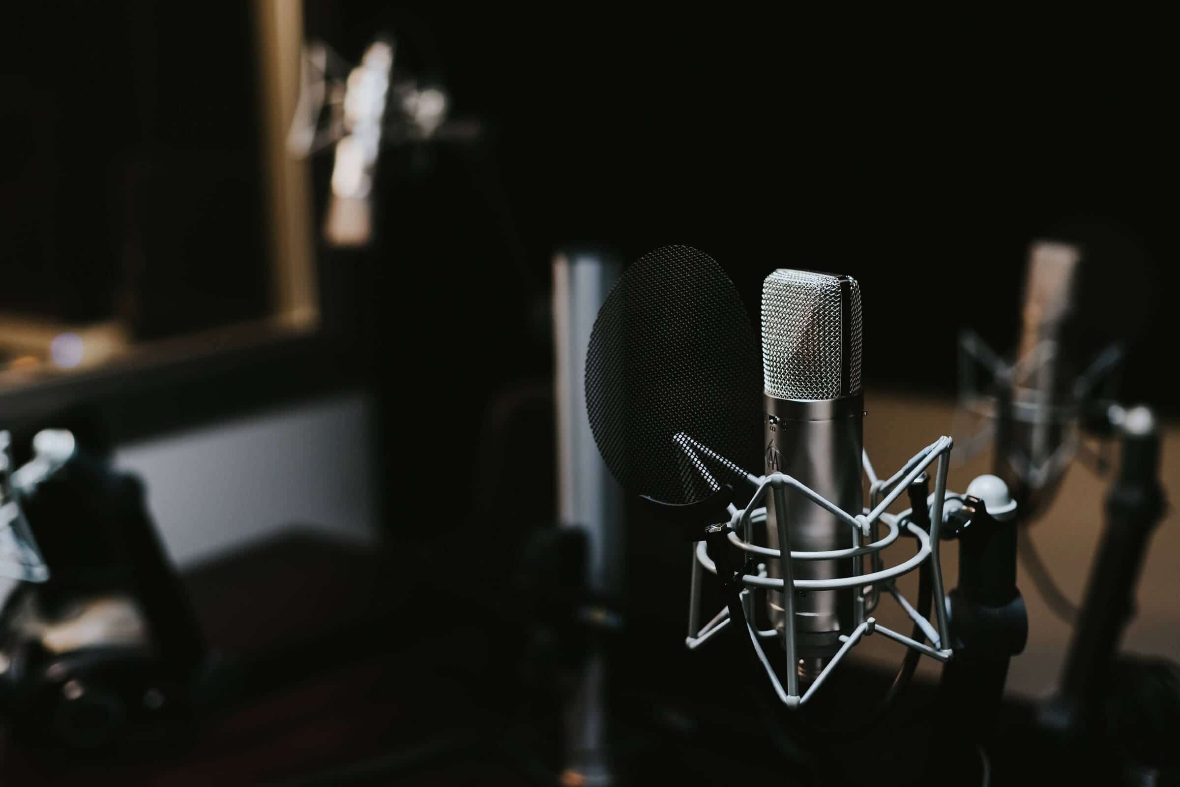 Experiment with indirect microphone placement in your podcast studio to find a natural-sounding recording with reduced plosives.