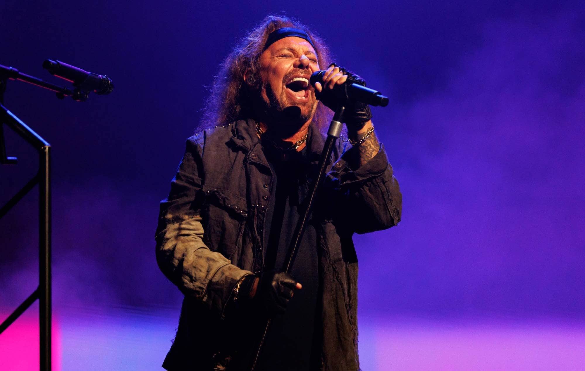 Vince Neil performing on stage, credit Christopher Polk, Billboard via Getty Images