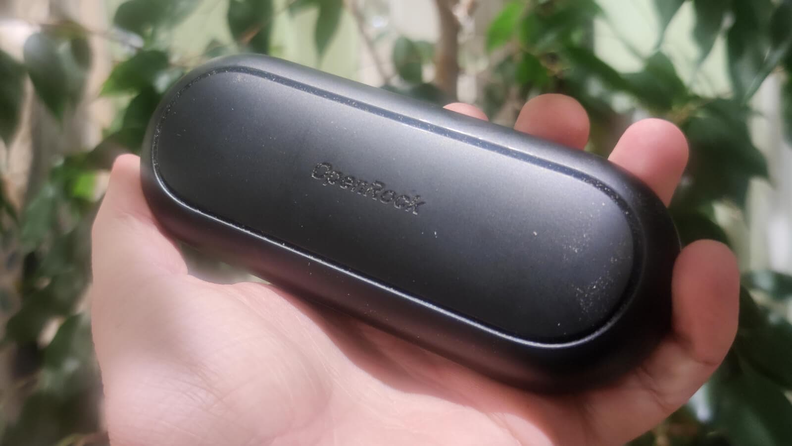 The bulky but sturdy charging case of the OpenRock S.