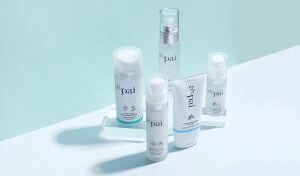 Pai Skincare Geranium & Thistle collection for oily and combination skin including rebalancing day cream and cleansing products arranged on mint green background