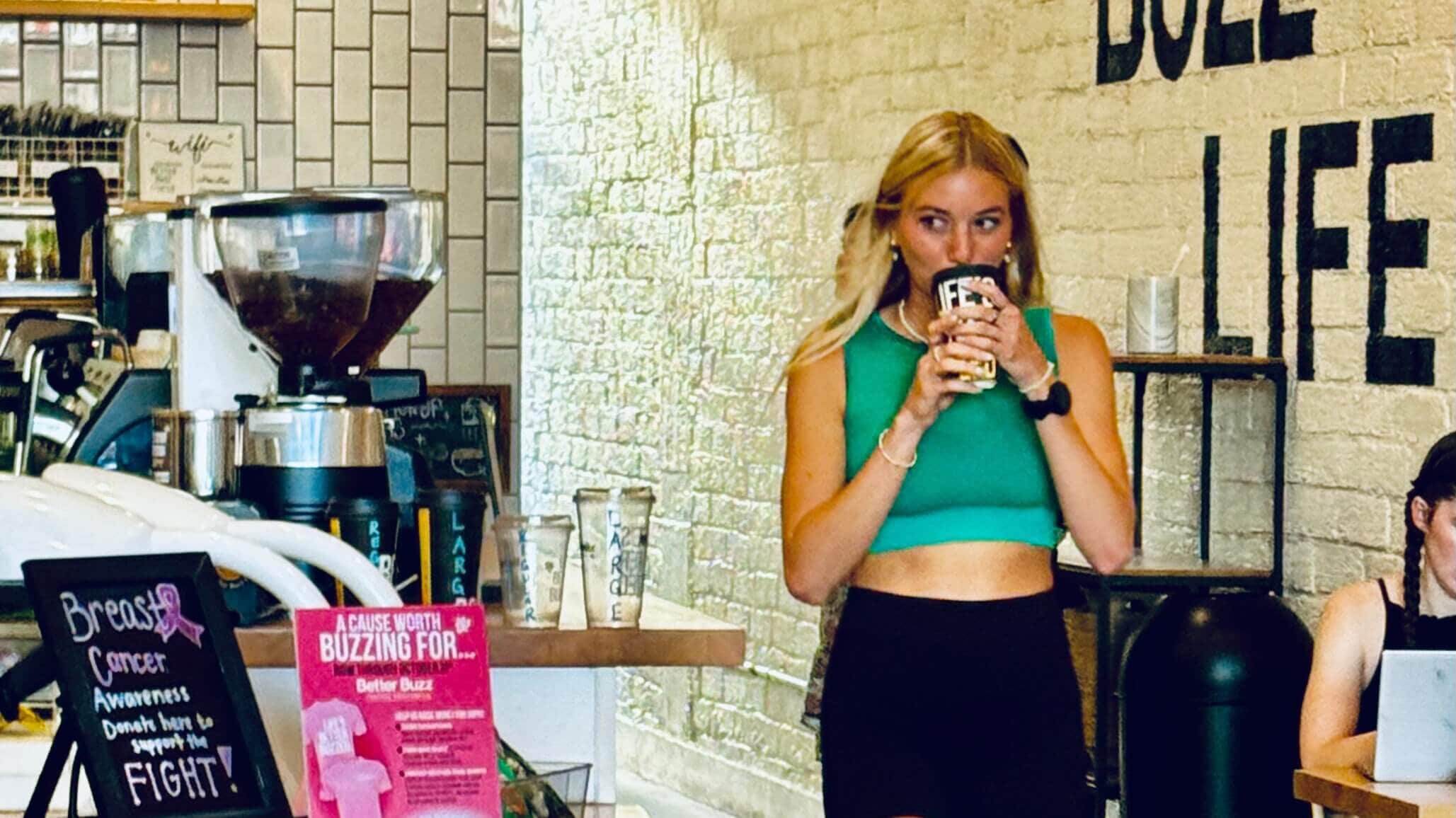 Girl sipping a cup of coffee