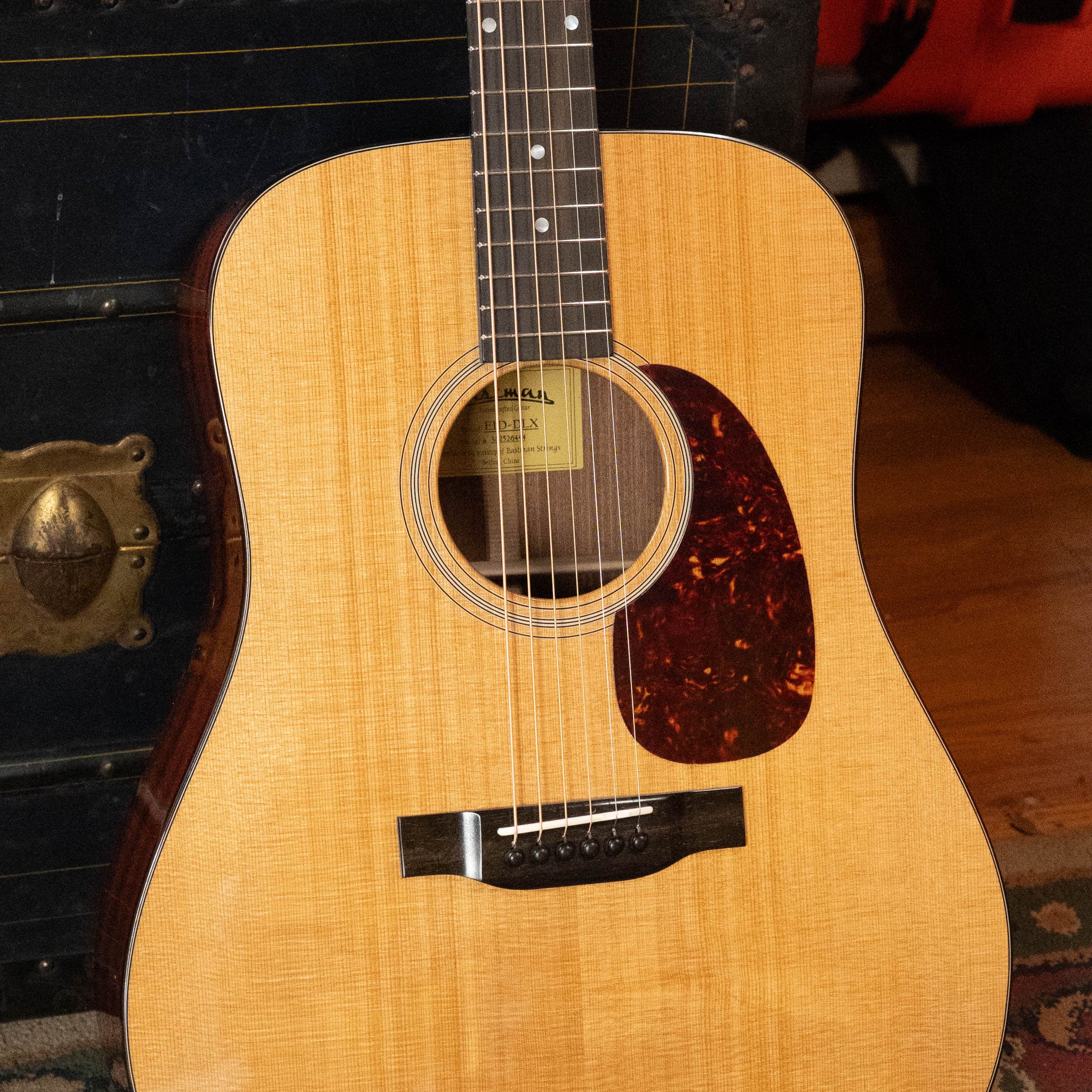 Eastman E1D-DLX Sitka spruce and sapele dreadnought in natural gloss with dark pickguard