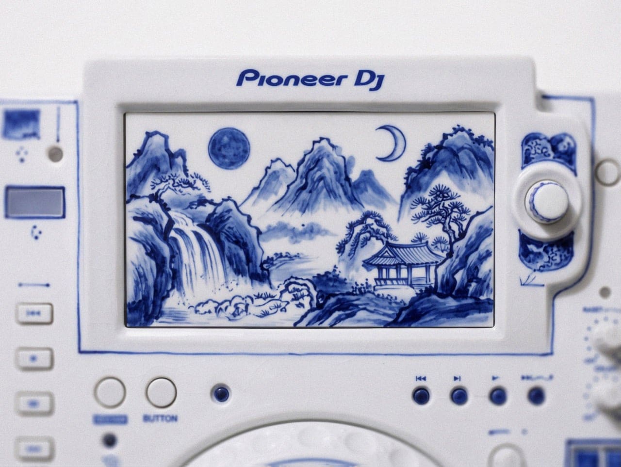 White-and-blue porcelain DJ mixer concept with ornate surface detailing