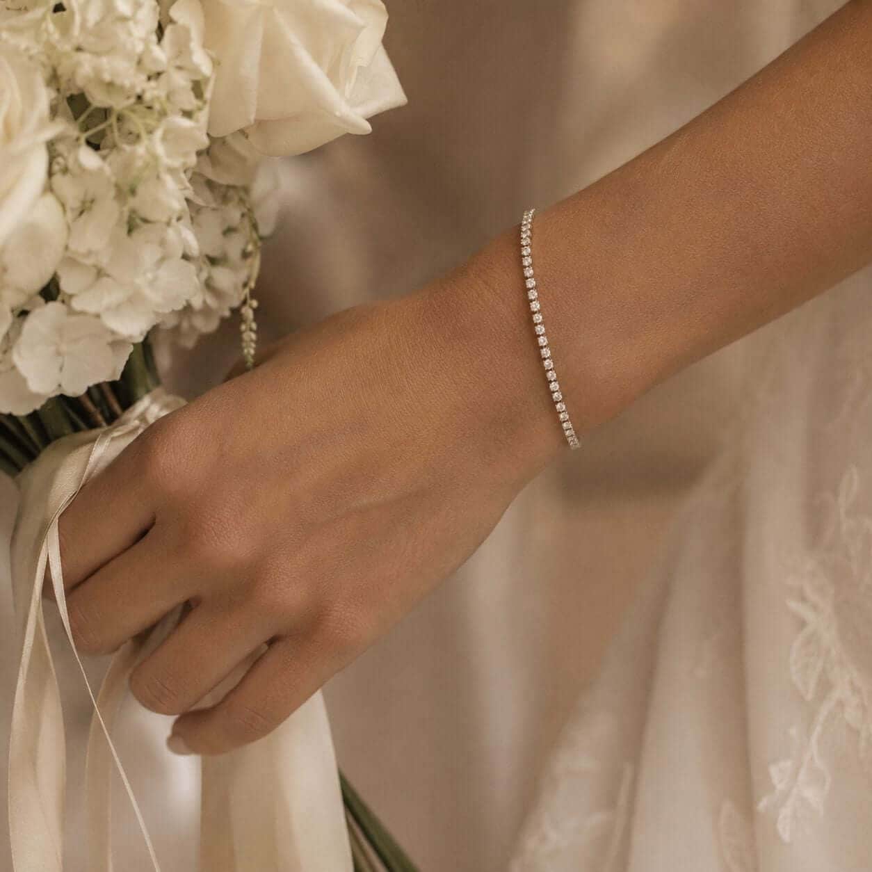 Diamond bracelet on a bride’s wrist