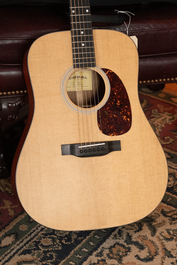 solid vs laminate acoustic guitars