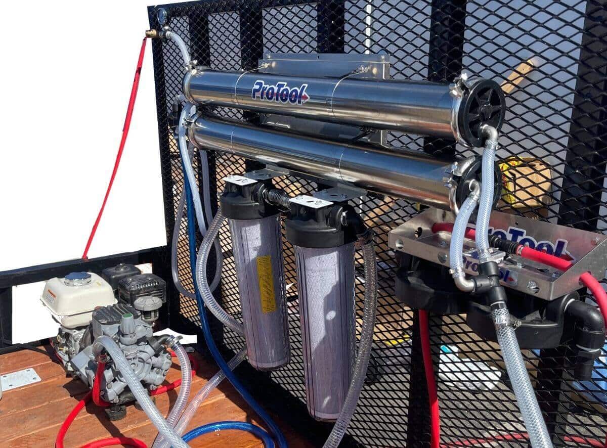 Dual high-flow RO membranes inside drone cleaning trailer