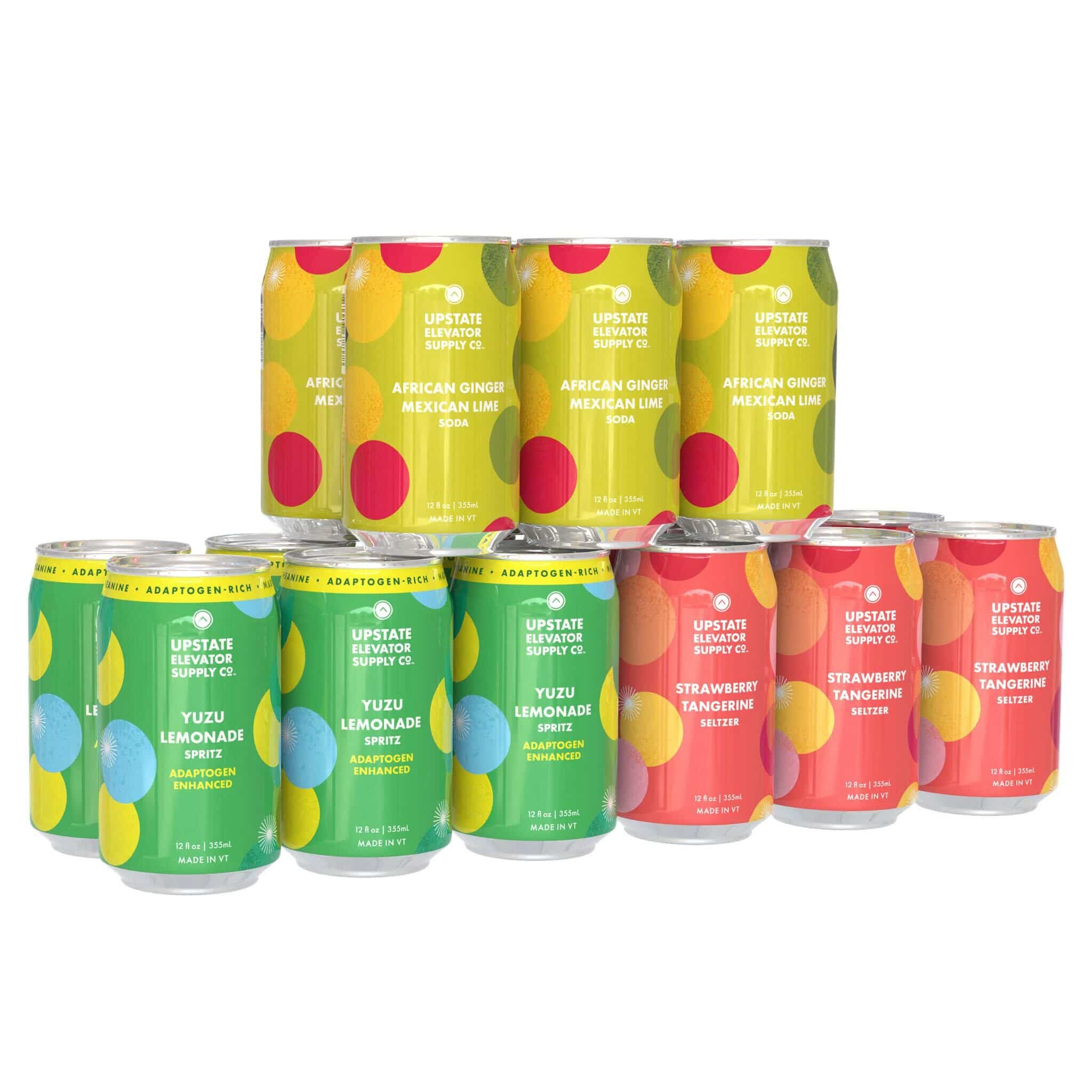 Stacked cans of Upstate Elevator African Ginger Mexican Lime Soda, Yuzu Lemonade Spritz and Strawberry Tangerine Seltzer from The CBD Drinks Pack
