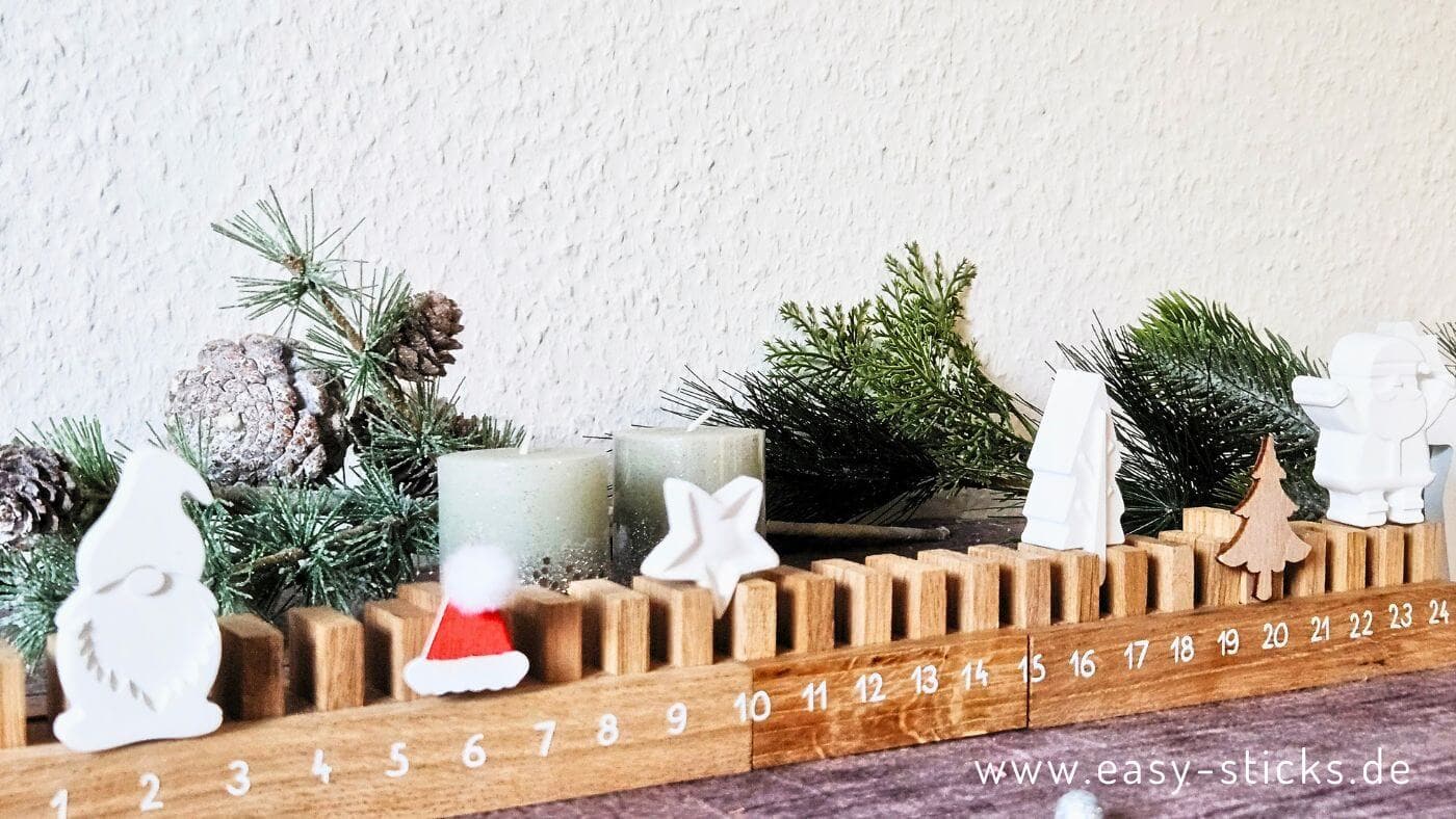 Bastelidee aus Holzklötzchen: eine Adventsleiste