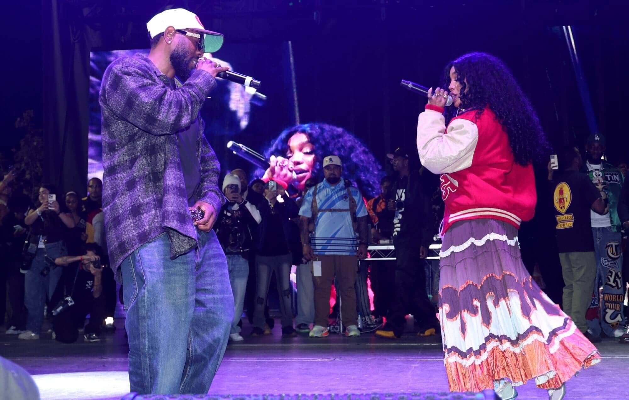 The iconic duo Kendrick Lamar and SZA reunite on stage at the TDE Christmas Concert.
