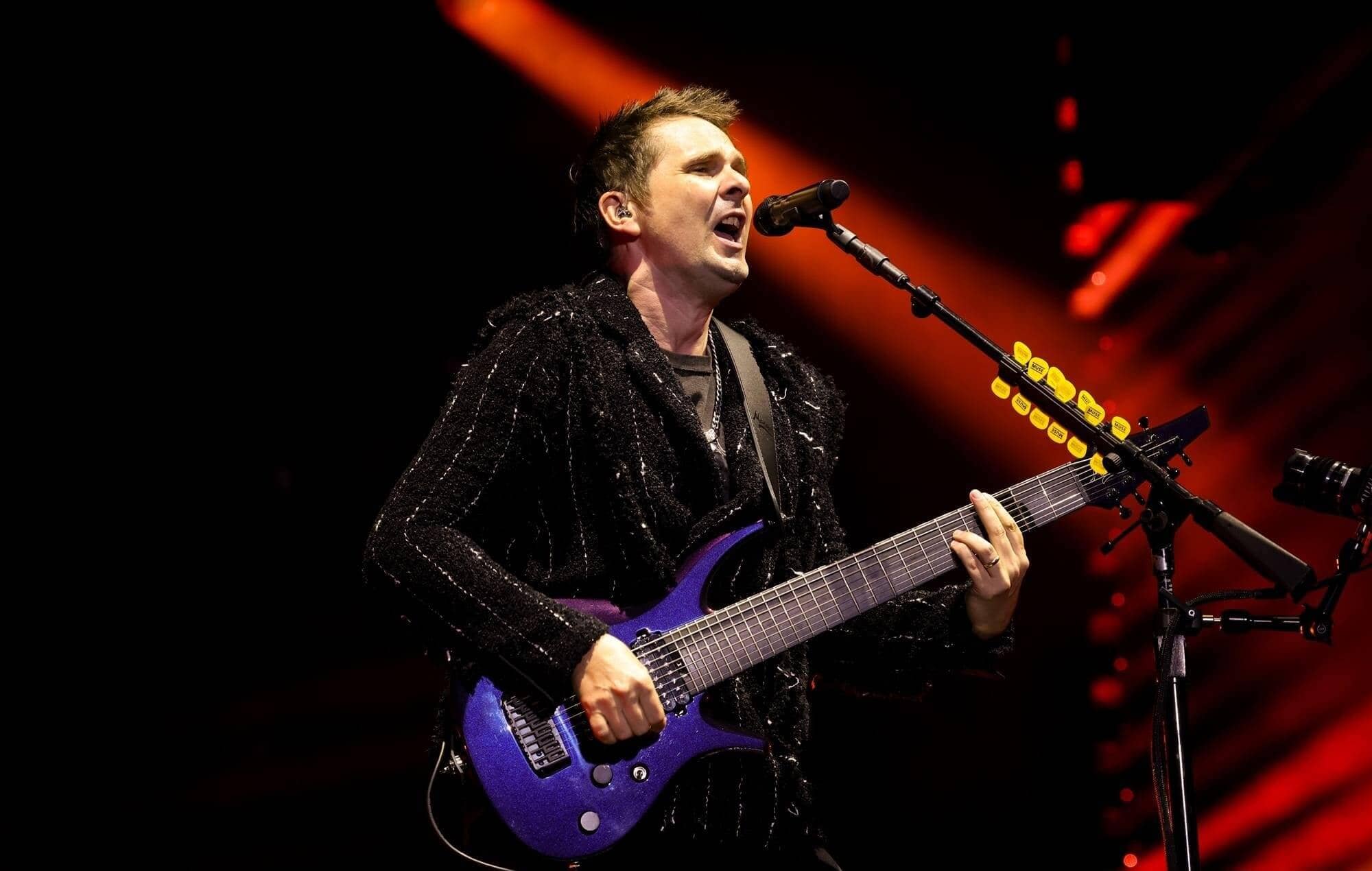 Matt Bellamy of Muse performing passionately