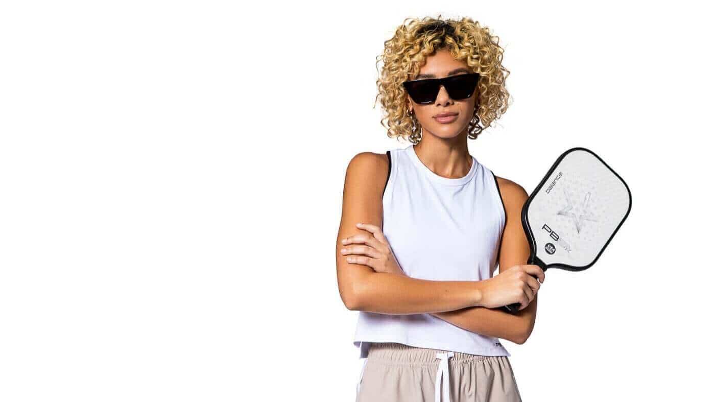 Woman holding PB5star balance paddle