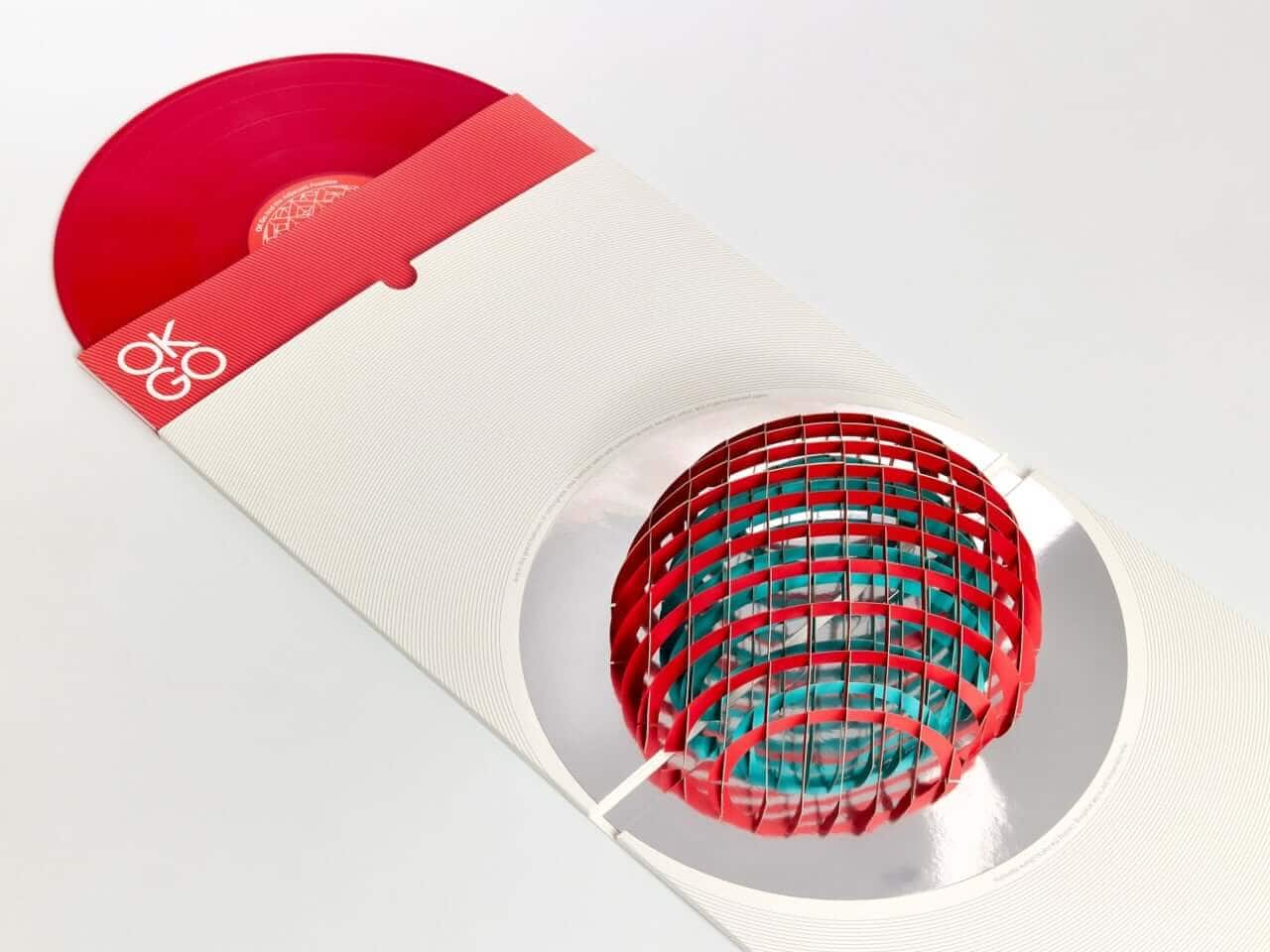 Interactive vinyl jacket with colorful geometric pop-up elements