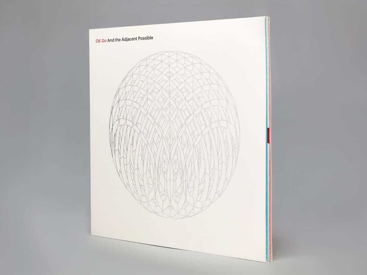 Three-dimensional album packaging opened to reveal its sculptural interior