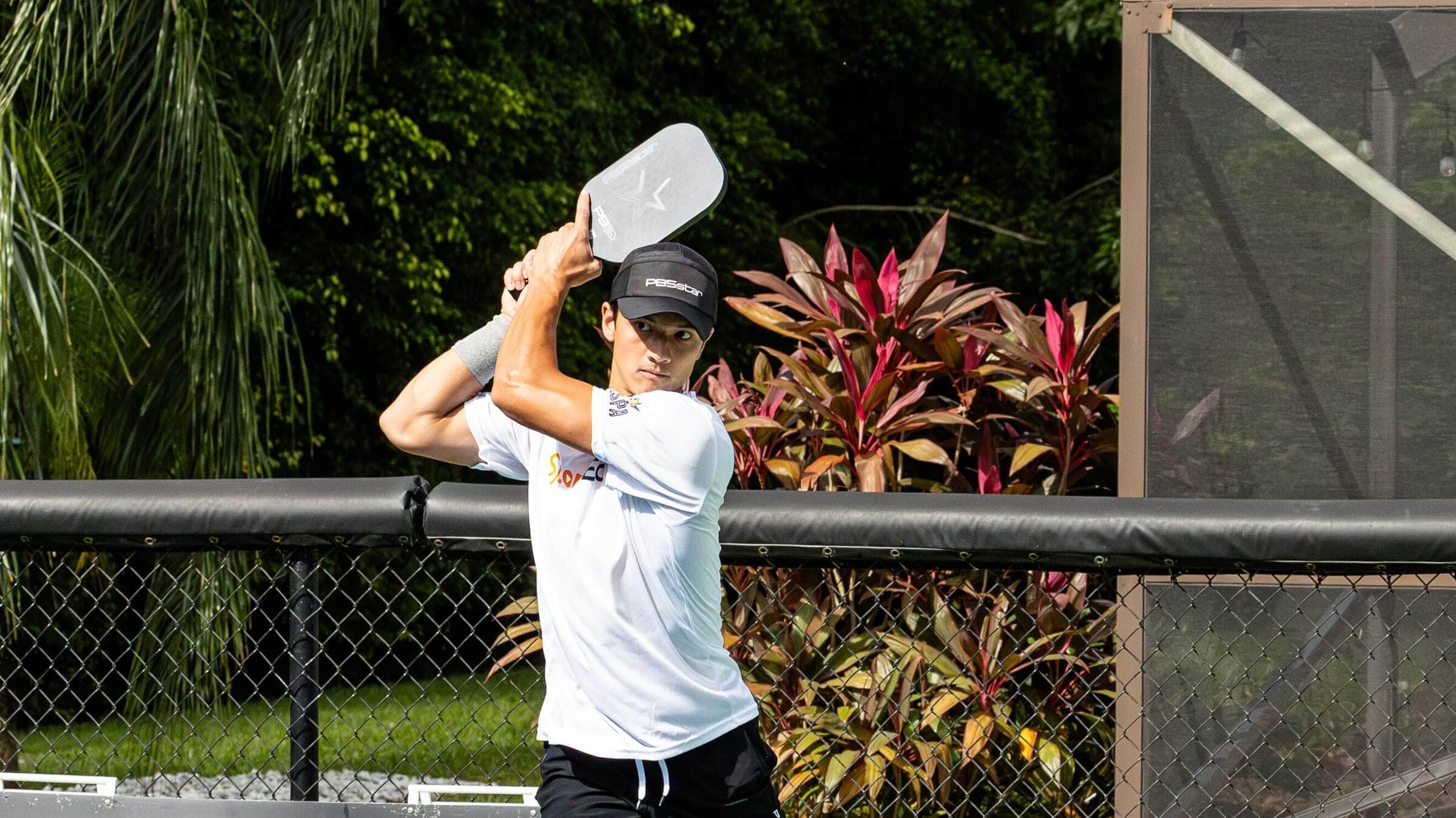 Pickleball player positioning to receive