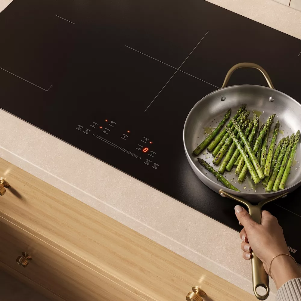 Cooktops vs. Rangetops: Asparagus cooking on induction cooktop. 