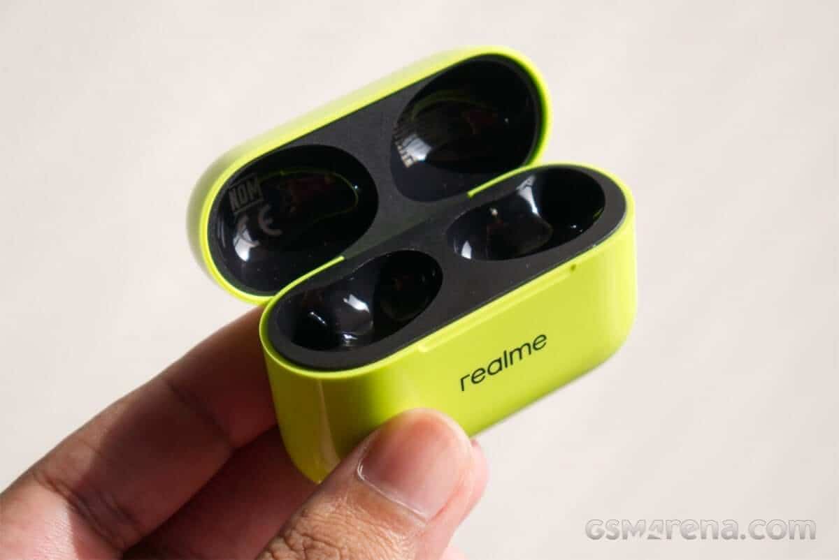 Charging case and earbuds close-up