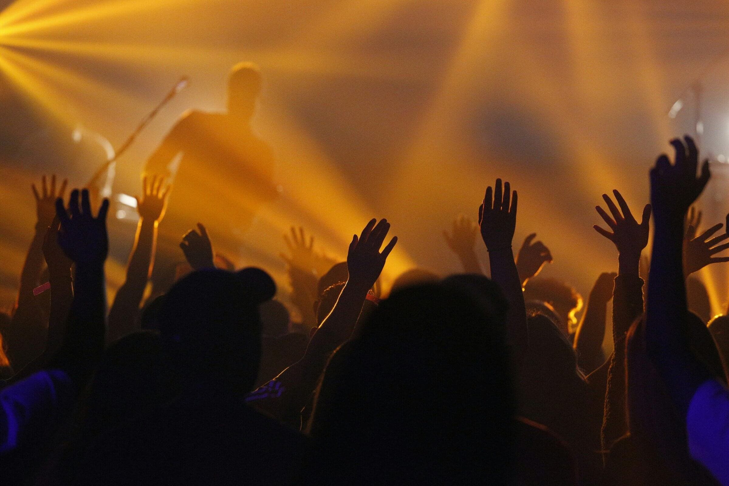 Live music concert crowd under stage lights