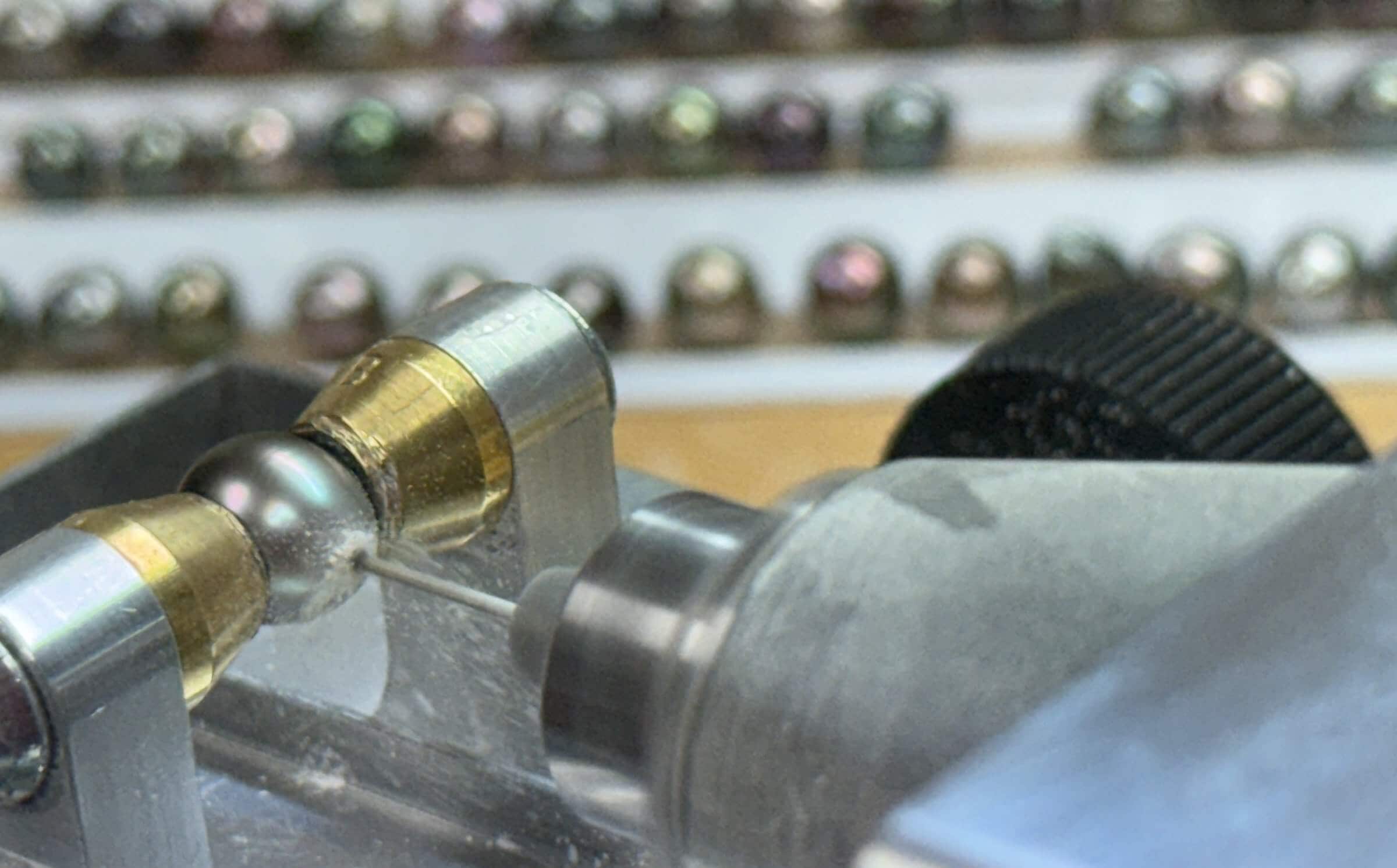 Each Tahitian pearl is drilled halfway through from either side