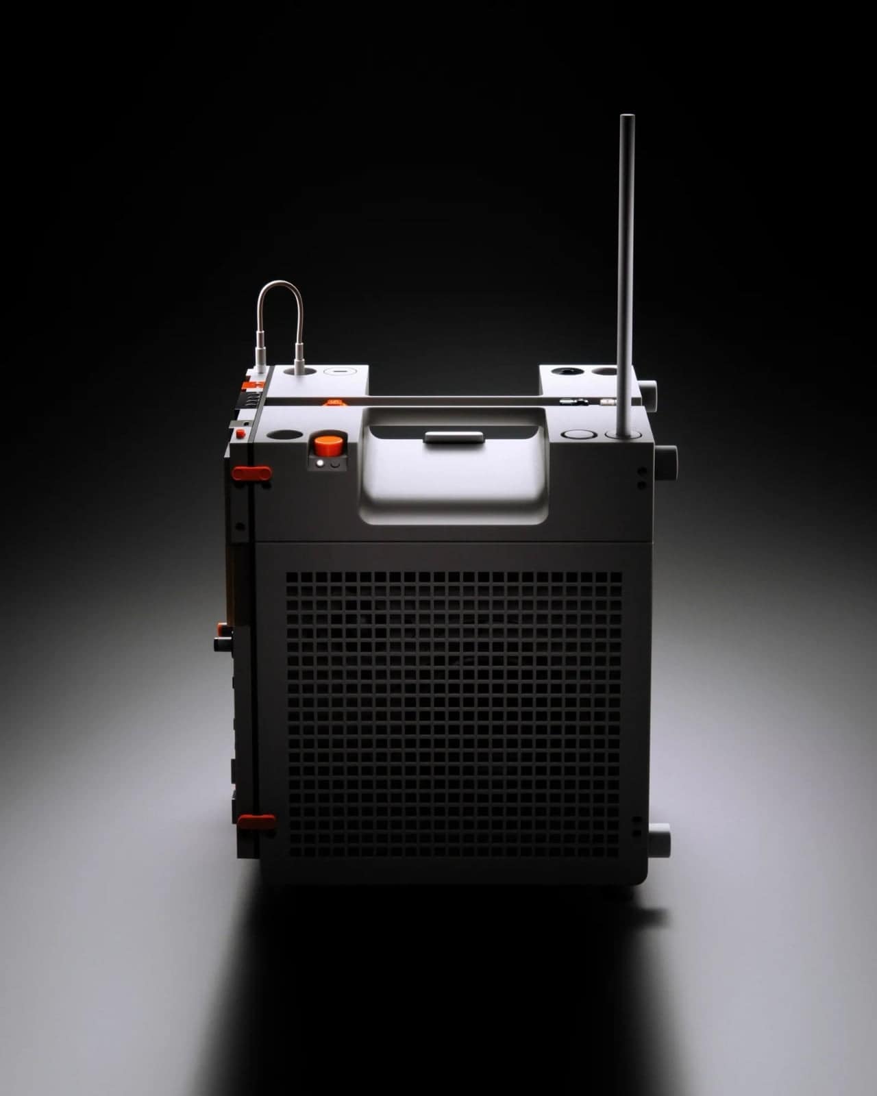 Front three-quarter view of the gray EP-35 amp with visible speaker drivers and orange accents