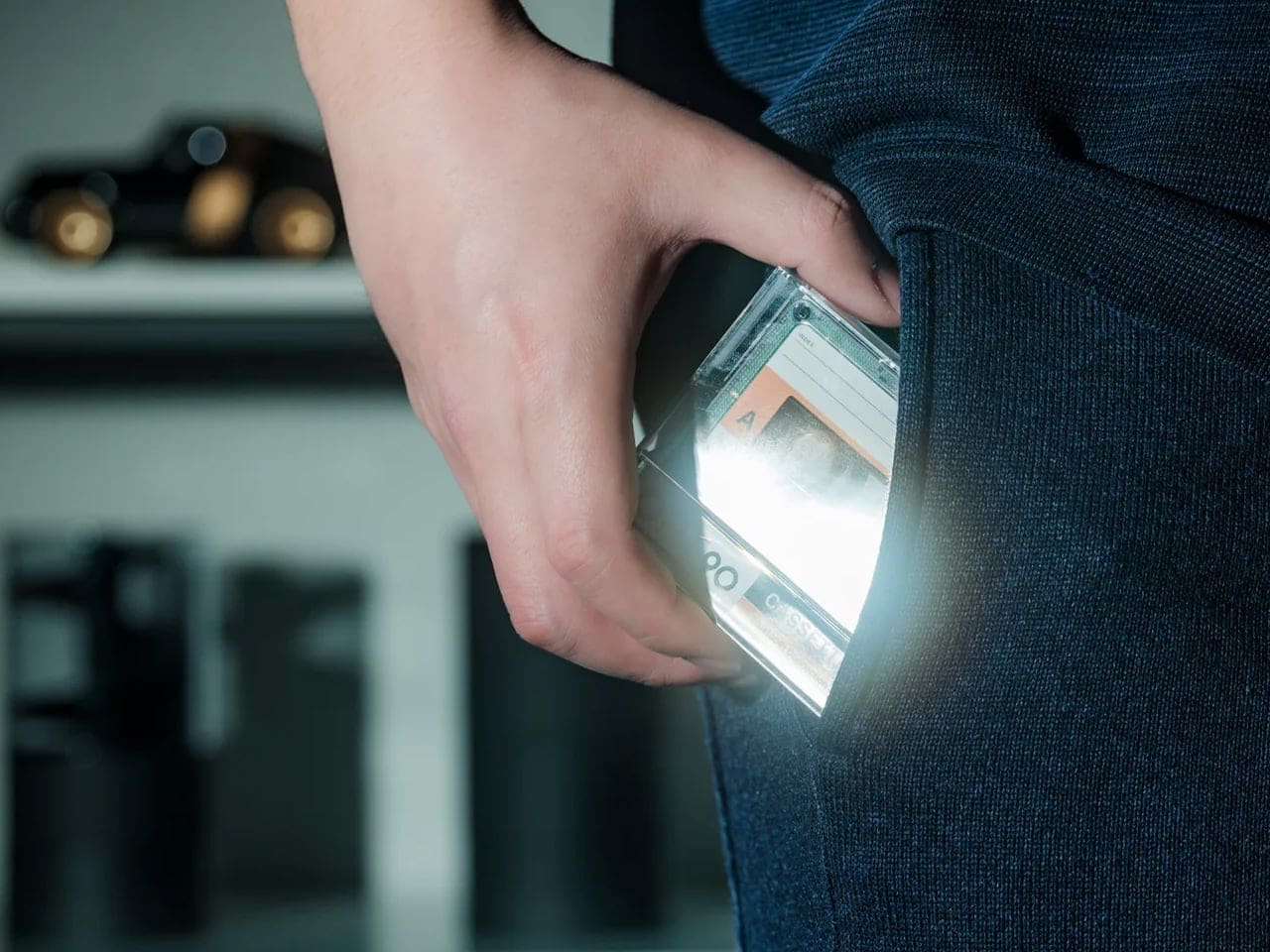 Compact Side A speaker shown with its clear protective case