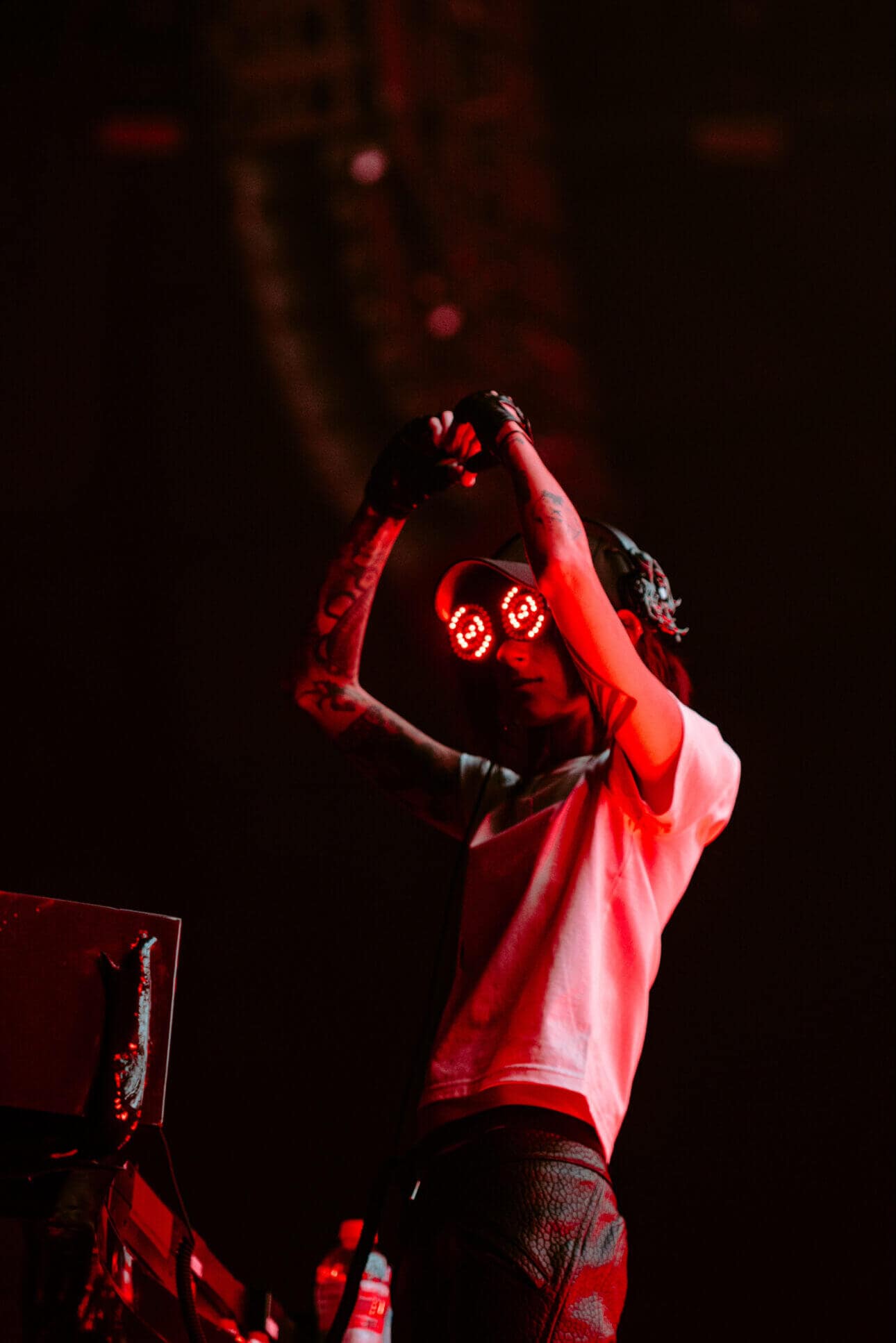 PORTAL visuals swirl around the stage, creating an otherworldly atmosphere.