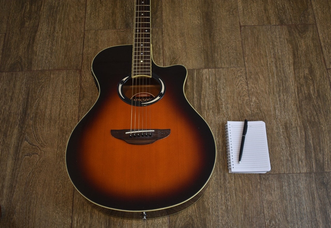 guitar-notepad-songwriting.jpg