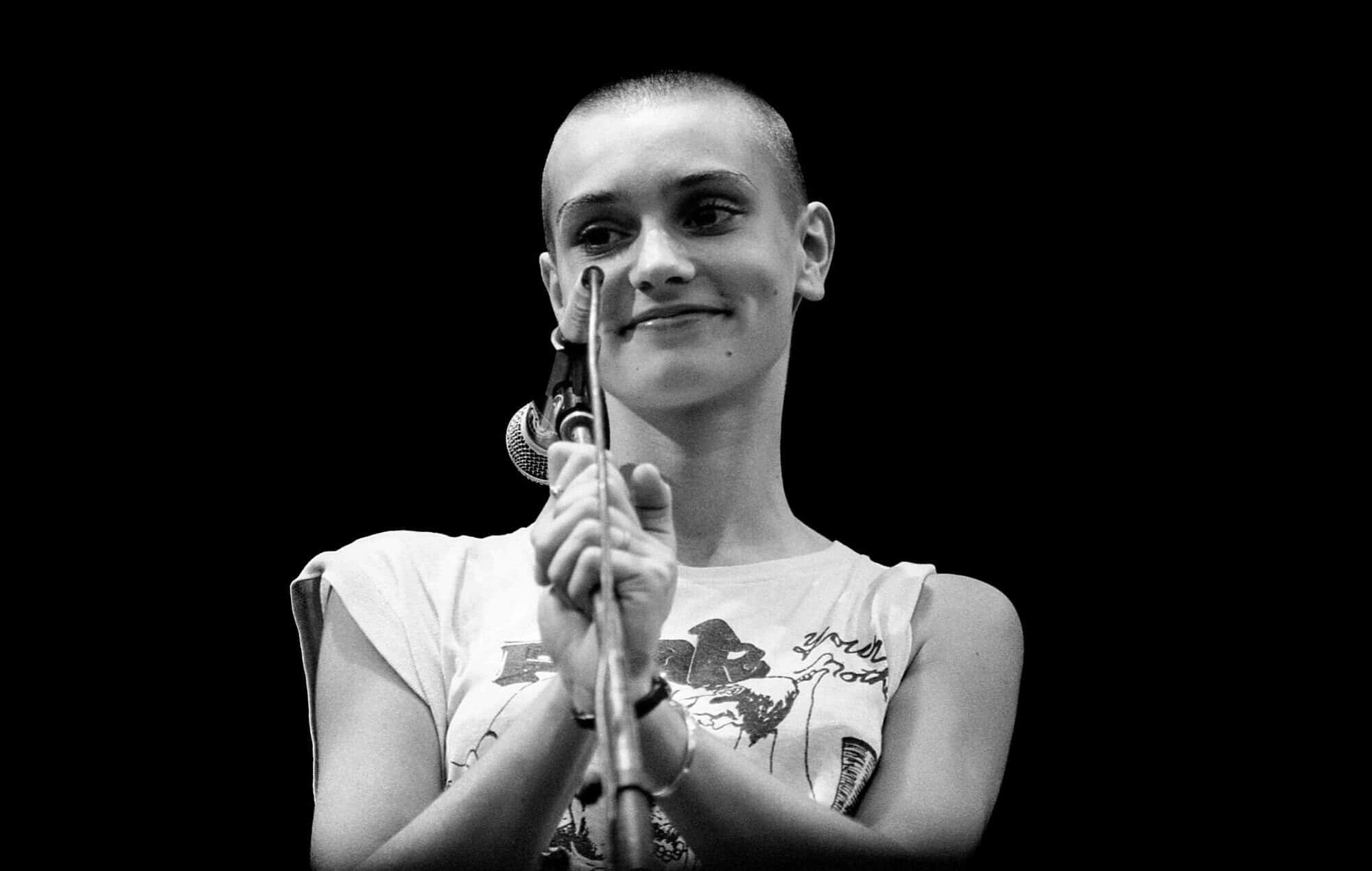 Sinead O'Connor performs on stage at Pinkpop Festival, Netherlands, 23rd May 1988. Photo by Michel Linssen/Redferns