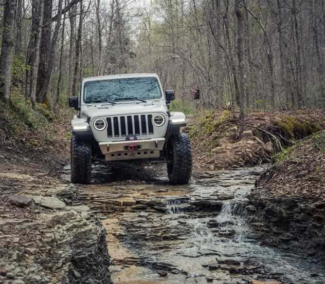 Off-Road Beasts Compared: Jeep Wrangler vs. Ford Bronco