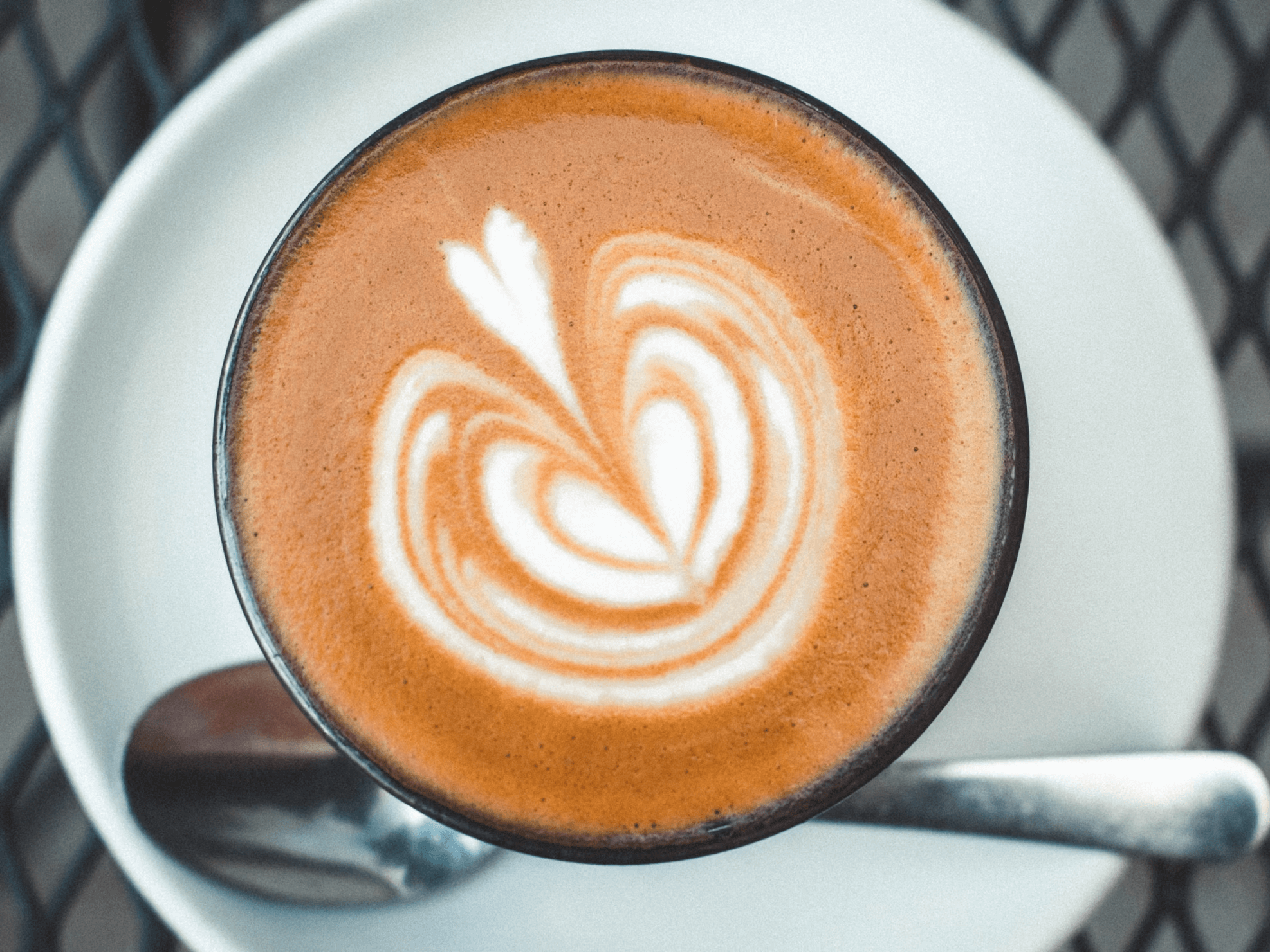 Heart-shaped latte art coffee.