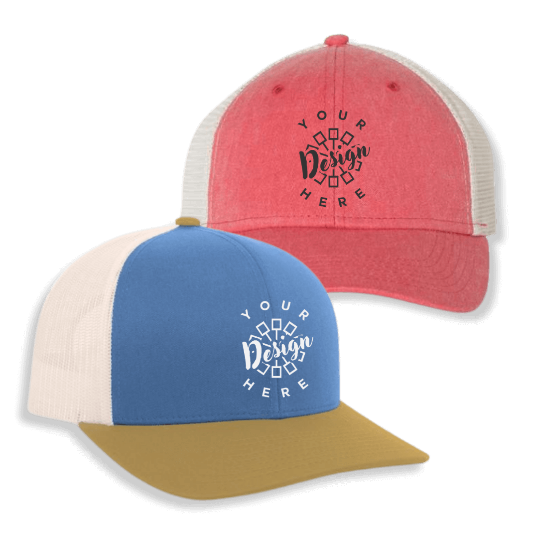Two custom trucker hats one blue and one pink, both with the "your design here" logo on them