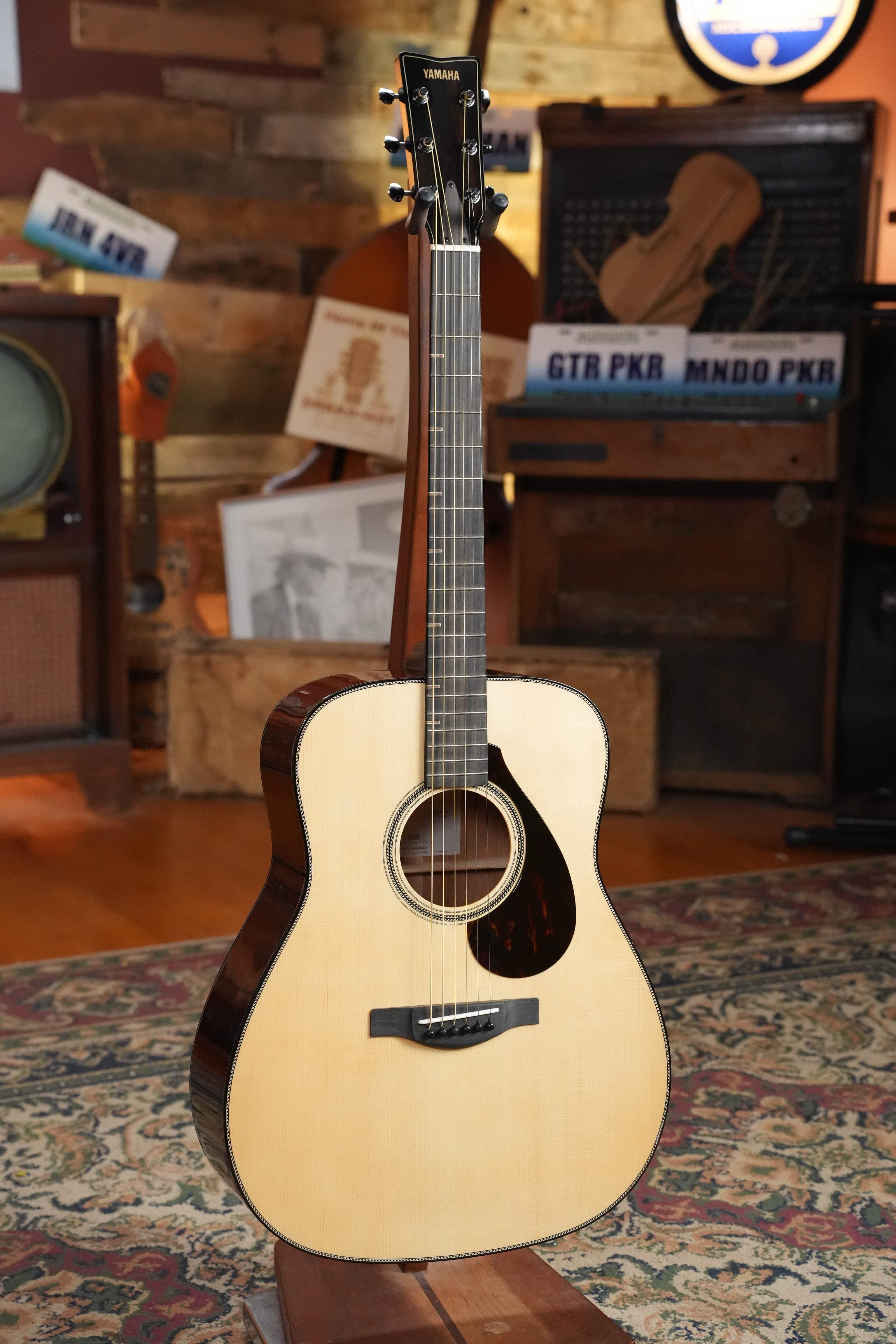 Yamaha FG9 M Adirondack and mahogany dreadnought #112A on a guitar stand