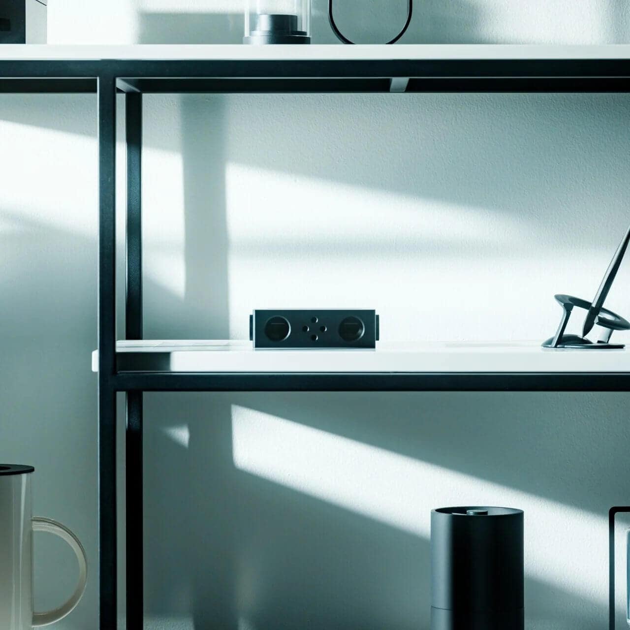The iSpeakers positioned with a smartphone in the acoustic slot