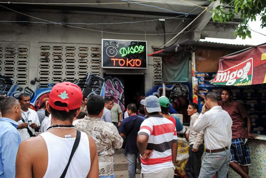 Prisoners line up to enter the Disco Tokio in Tocorón Prison, controlled by TdA