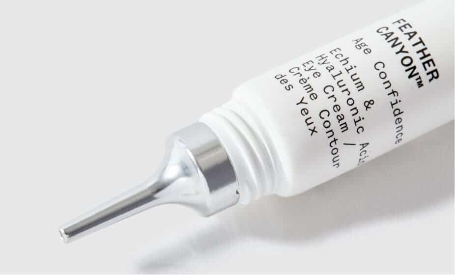 Feather Canyon eye cream tube with precision tip applicator on white background