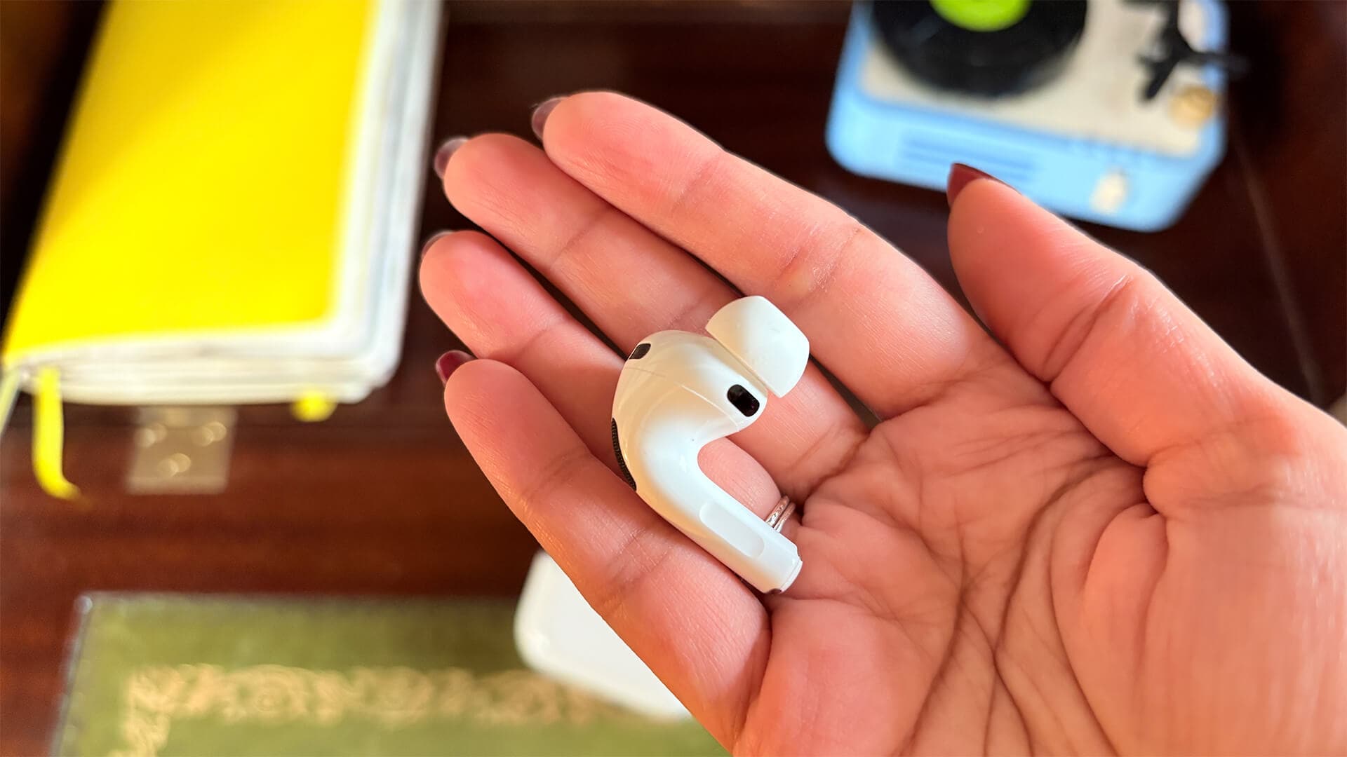 Close-up of AirPods Pro 3 showcasing their compact form