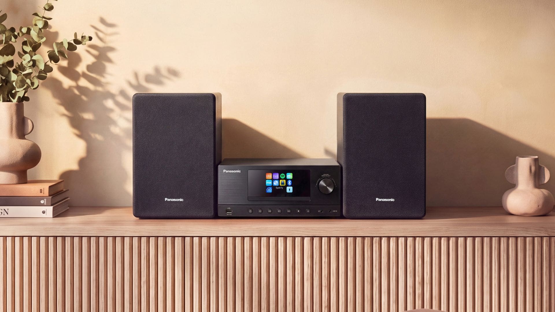 Panasonic SC-PMX112E-K micro hi-fi system in a home setting