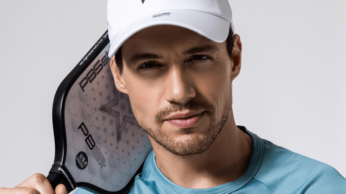 Pickleball player holding a paddle