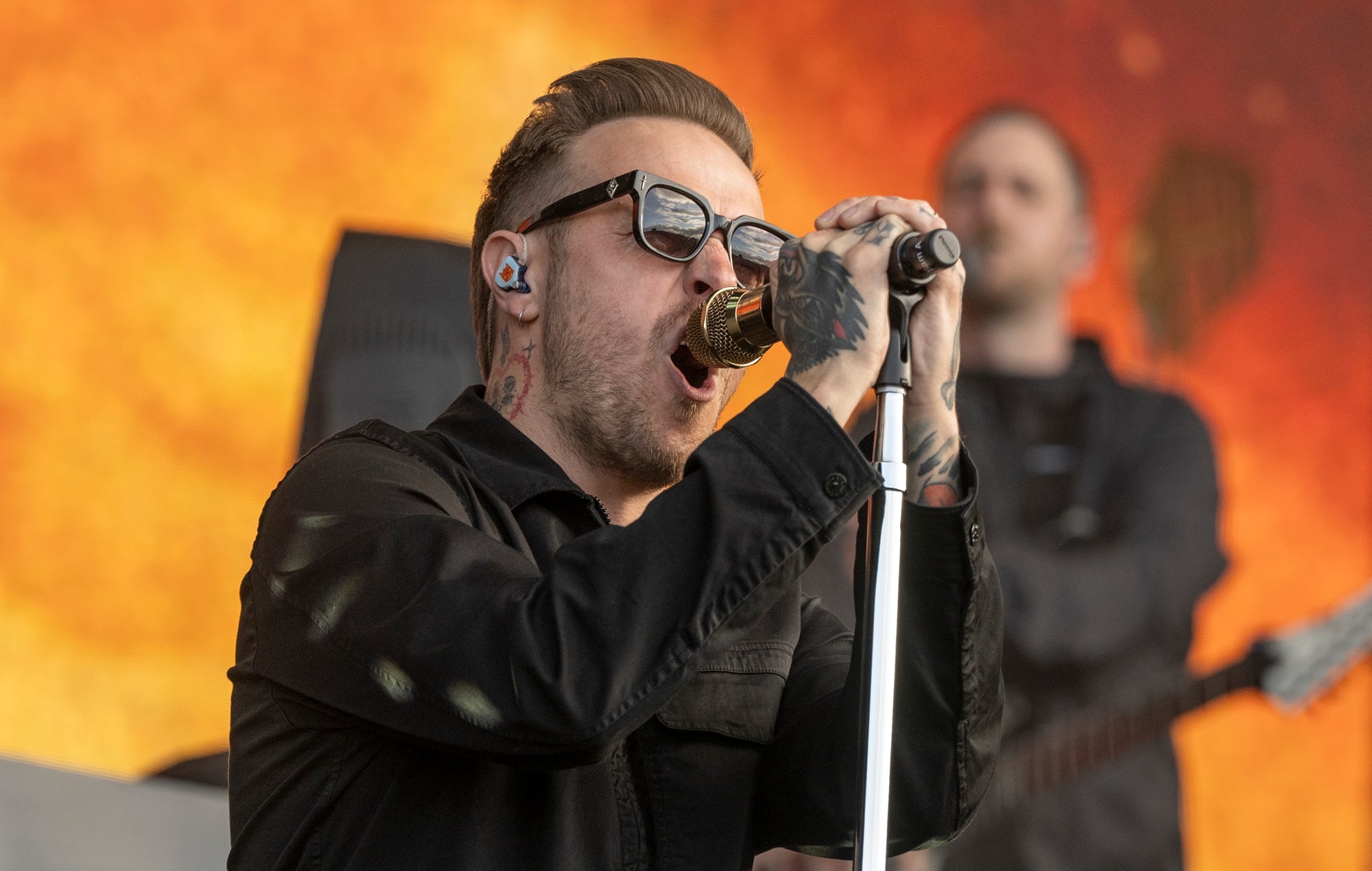 Sam Carter performing with Architects