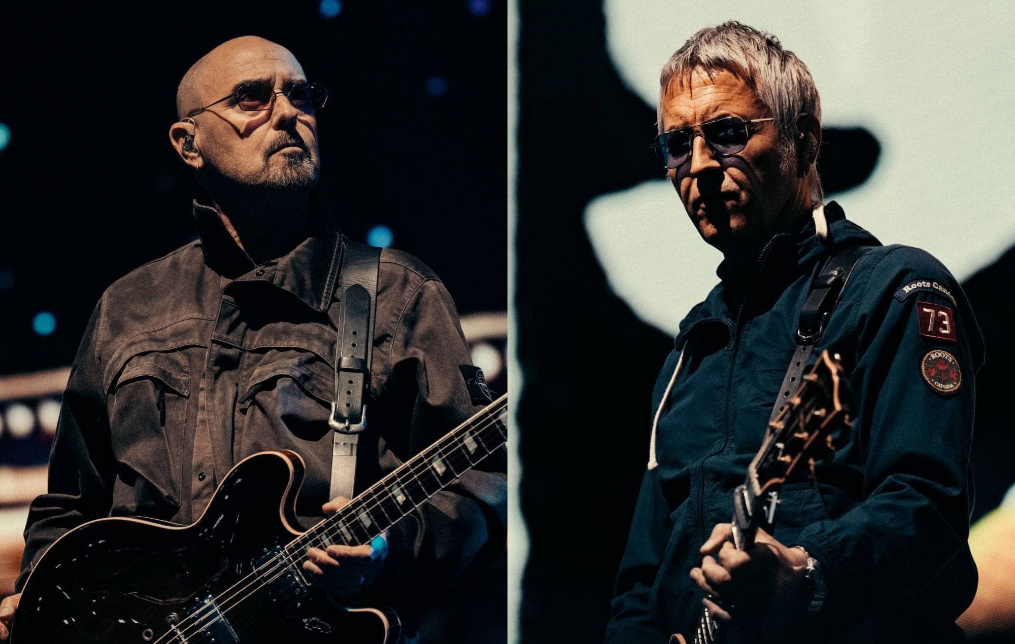 Bonehead and Gem Archer playing guitar together on stage