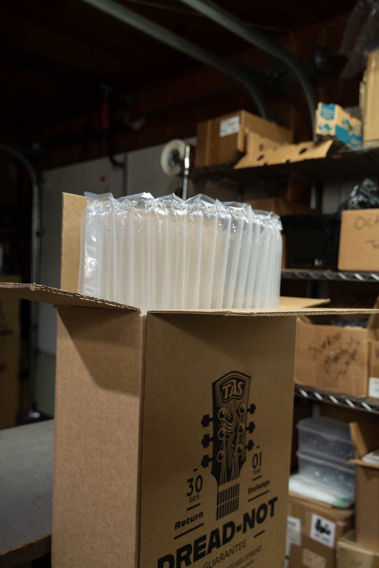 Dread-Not Guarantee shipping box lined with air-column packing in the TAS stockroom