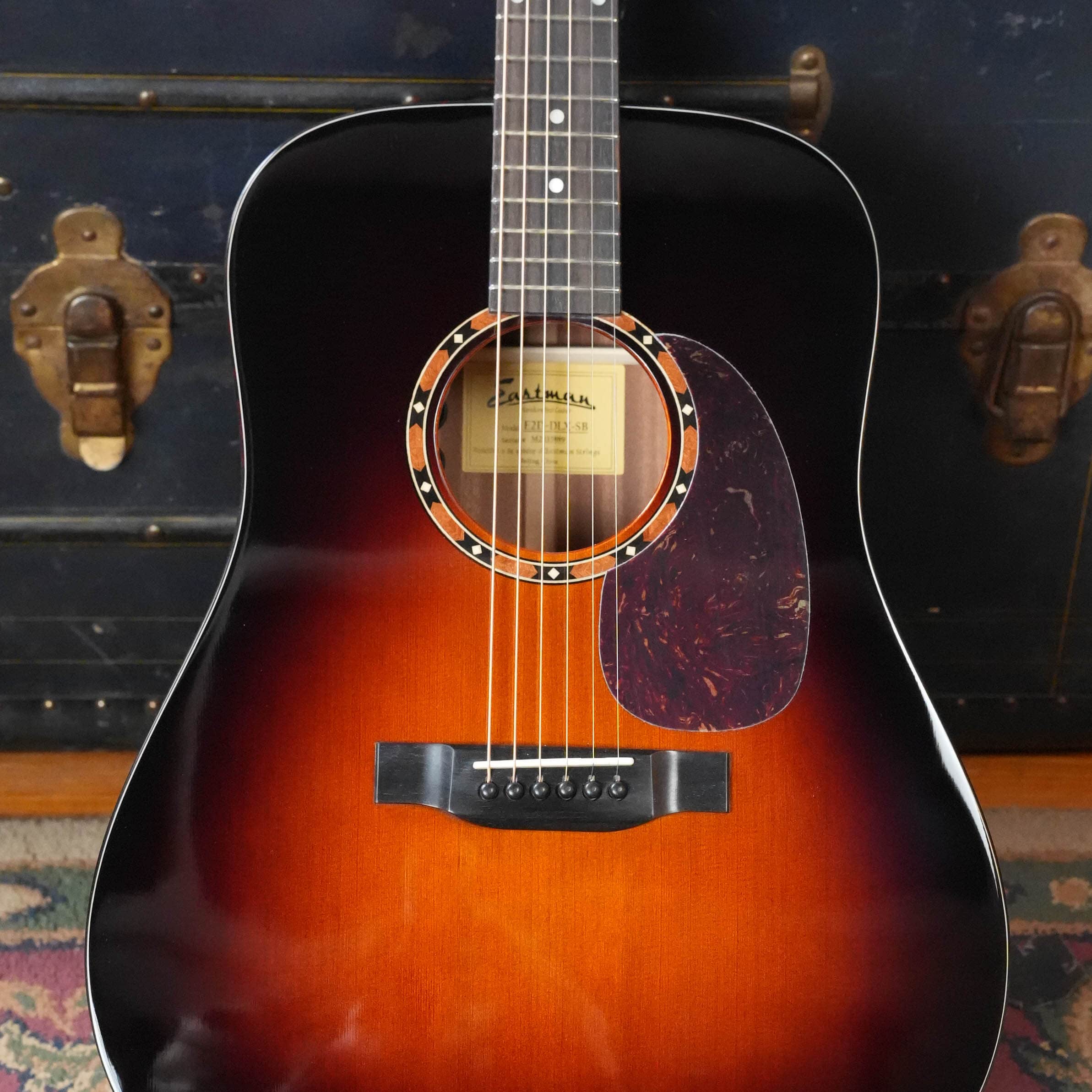 Eastman E2D-DLX-SB cedar top dreadnought in gloss sunburst with tortoise pickguard