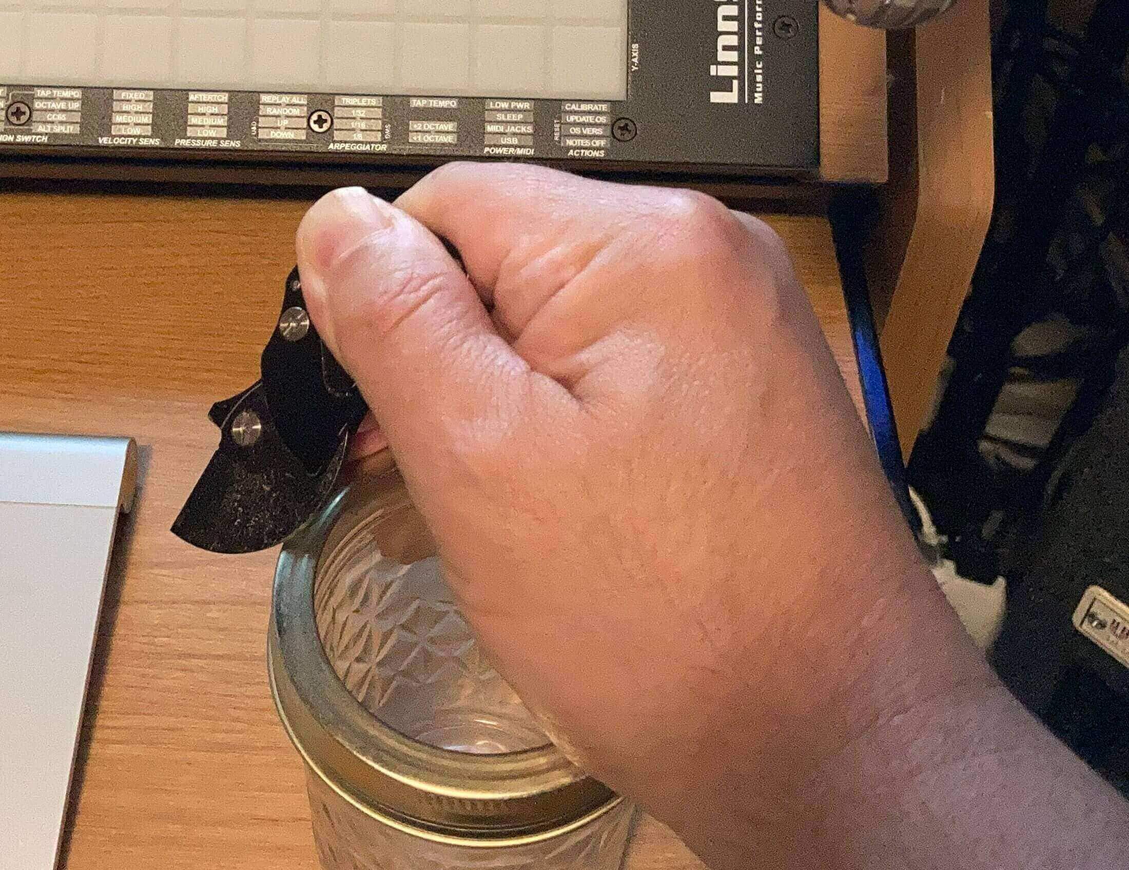 Knife-scraping on a Mason jar