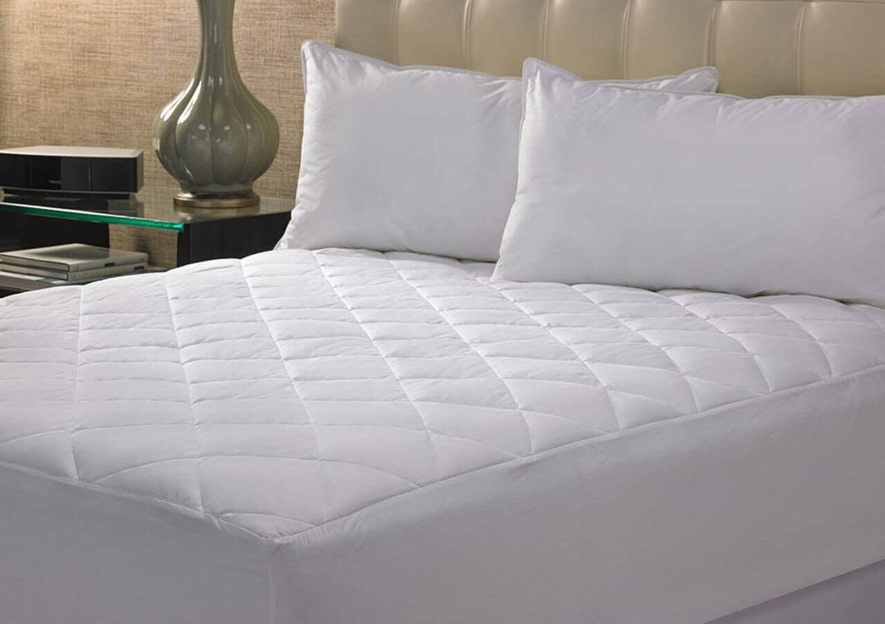 Which Store Offers Mattress Pads in Bulk for a Motel?