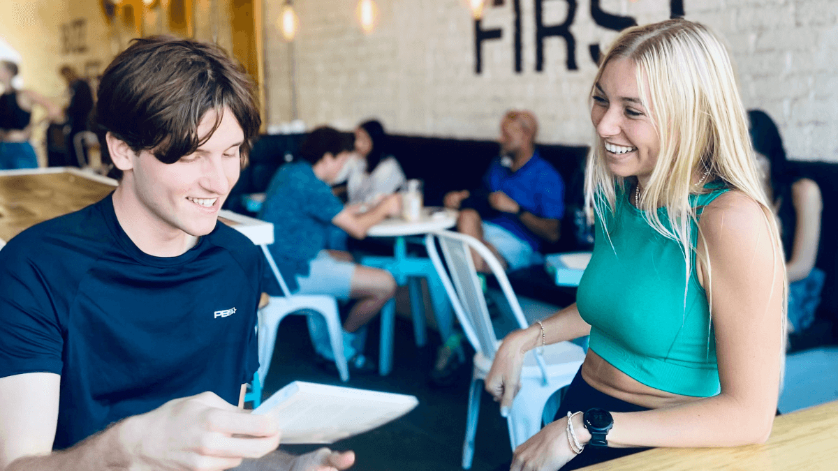 girl and boy at a cafe