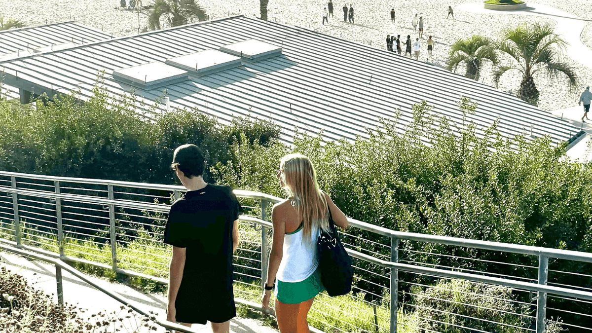 Pickleball players walking to the beach
