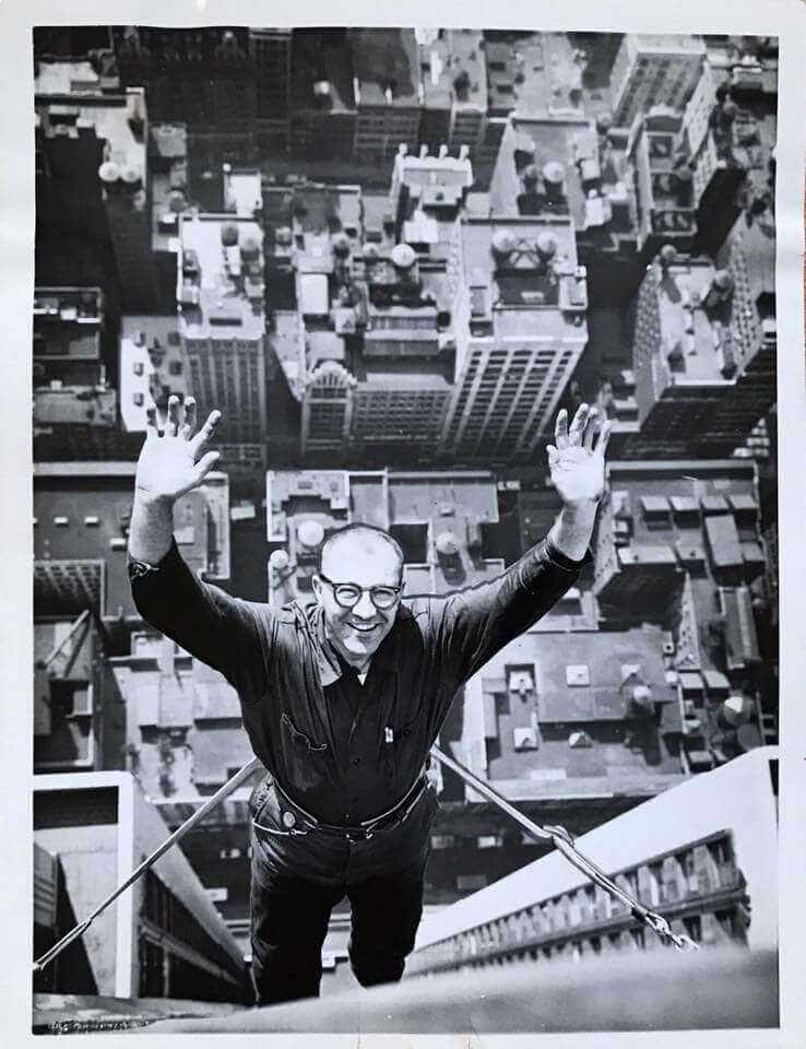 Historic high-rise window cleaners on a building facade, courtesy of Noa Pedersen