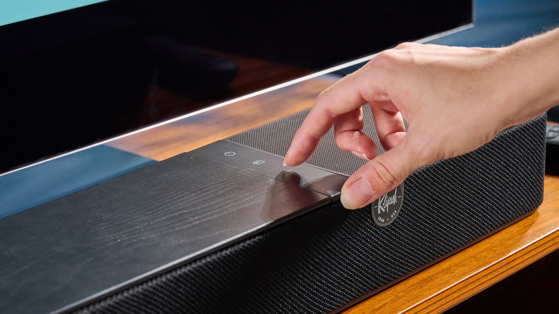 Klipsch Flexus Core 100 Soundbar close-up with controls and remote