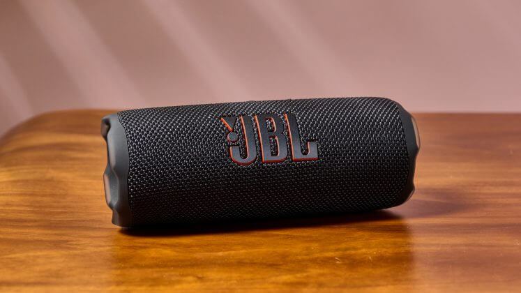 The JBL Flip 7 resting steadily on a table