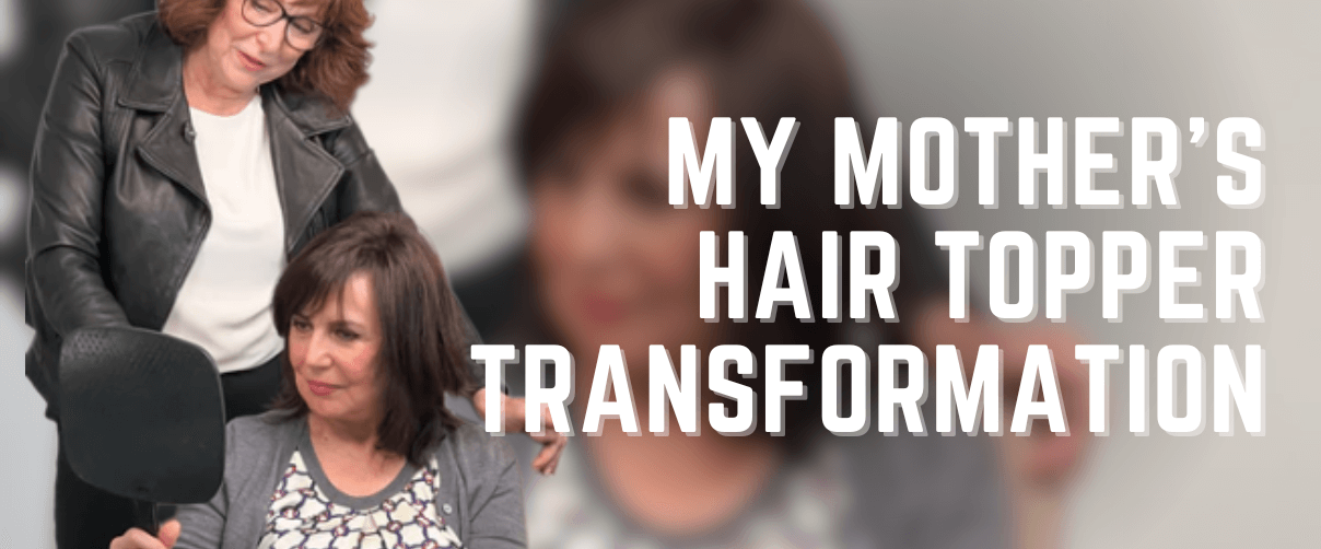 Woman smiling and holding a mirror with her stylist after a hair topper transformation.