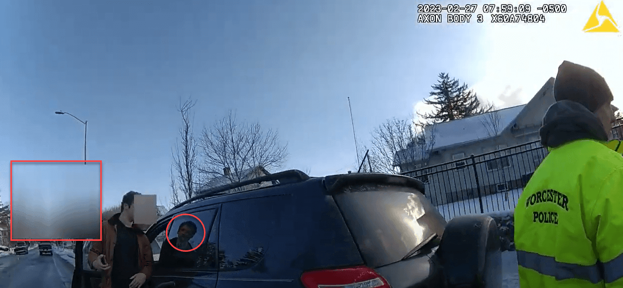 Body worn camera frame showing a redaction mask that failed to track a moving subject